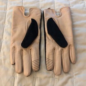 Tan and black winter gloves